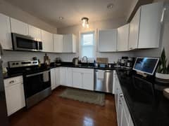 Original Kitchen before Warm traditional transitional with plants and soft green accents AI redesign
